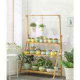 Bamboe Plantenrek – 3-Laags Opvouwbare Plantenstandaard – Plantentrap met Ophangrek – Bloementrap voor Binnen & Buiten – Houten Plantenhouder – Decoratief Bloemenrek – 100 x 40 x 96 cm – Inclusief Tuingereedschap & Haken – Ruimtebesparend & Stevig