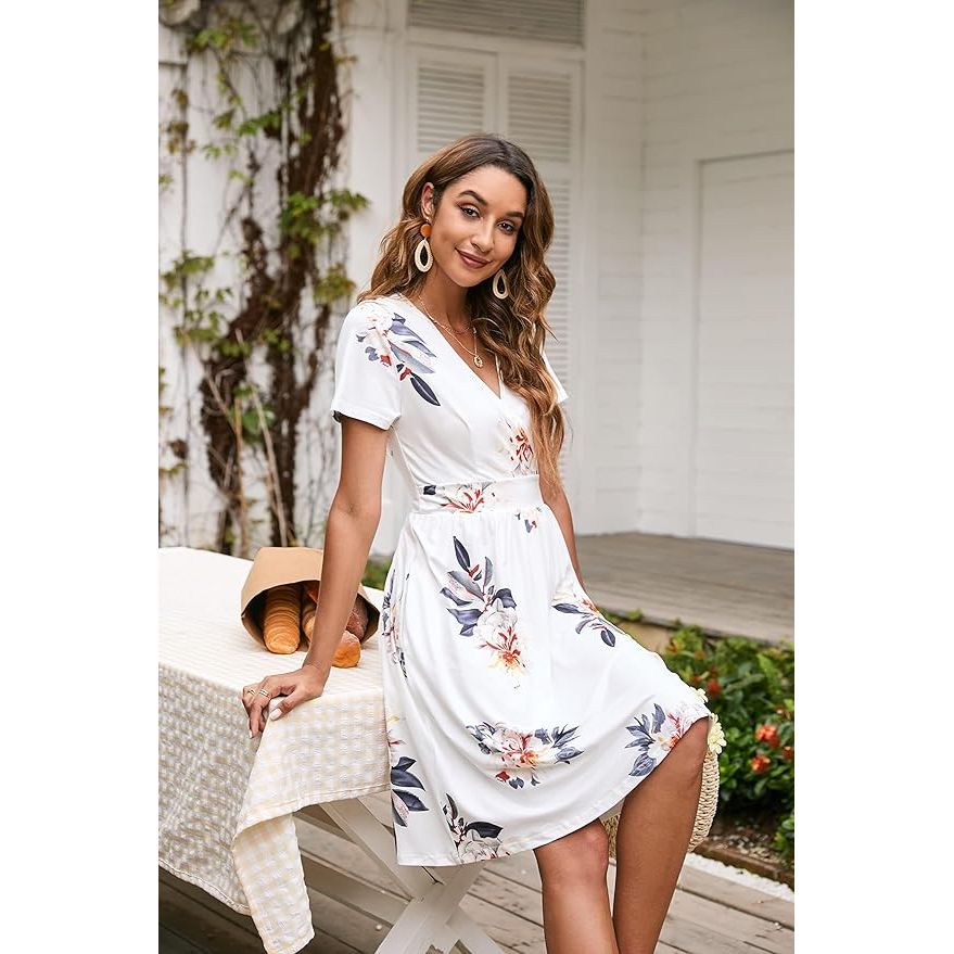 V-Hals Zomerjurk Dames - Kort Mouwloos - Midi Jurk met Plooitaille en Zakken - Elegante Wikkeljurk - Casual Strandjurk - Bloemenprint - Luchtige V-Hals Zomerjurk Dames - Kort Mouwloos - Midi Jurk met Plooitaille en Zakken - Elegante Wikkeljurk - Casual Strandjurk - Bloemenprint - Luchtige